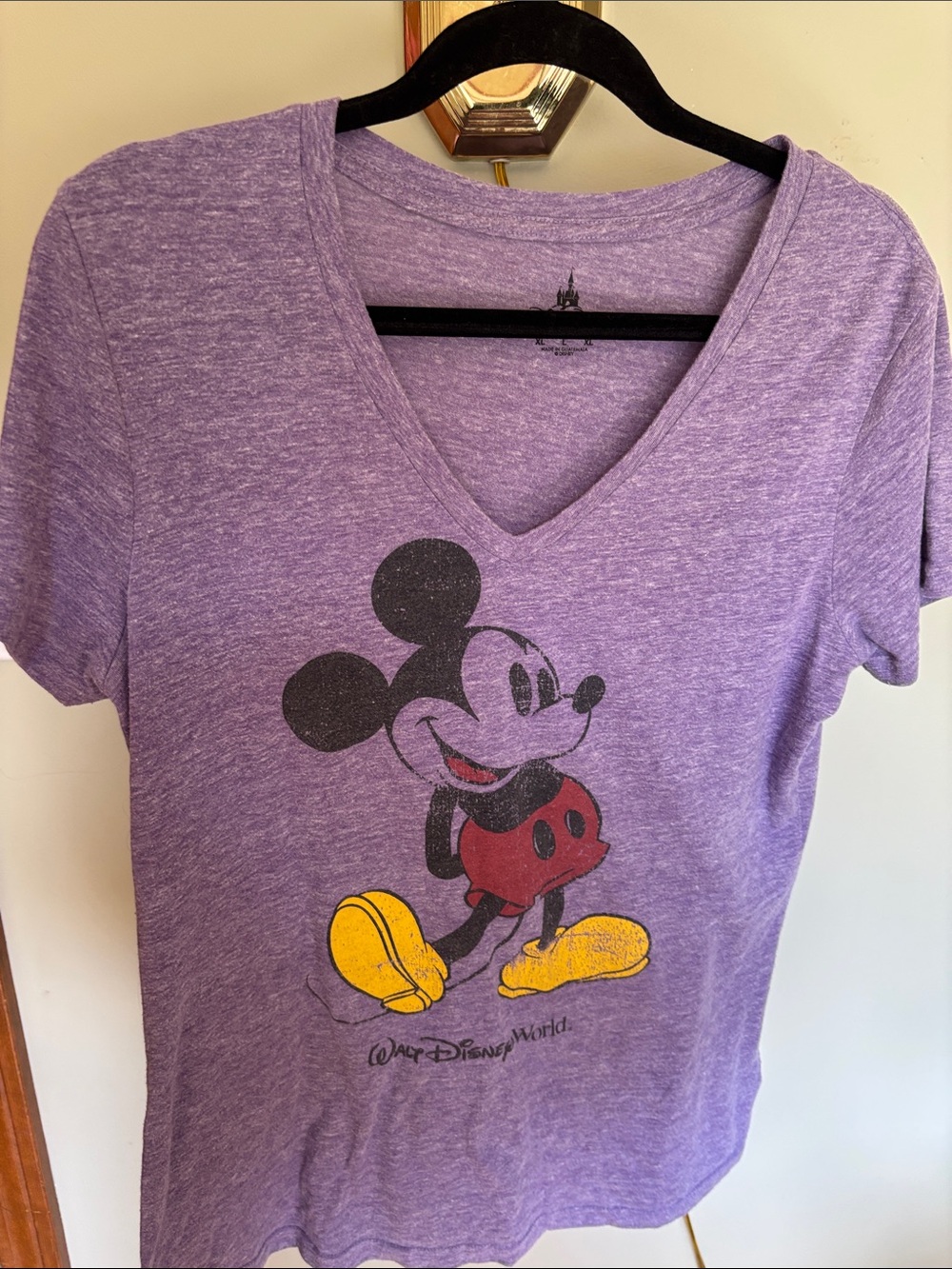 Disney Purple V-Neck Mickey Graphic Tee with Red and Yellow Accents